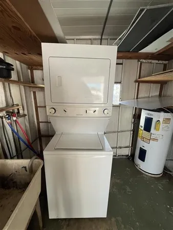 a utility room with dryer and washer