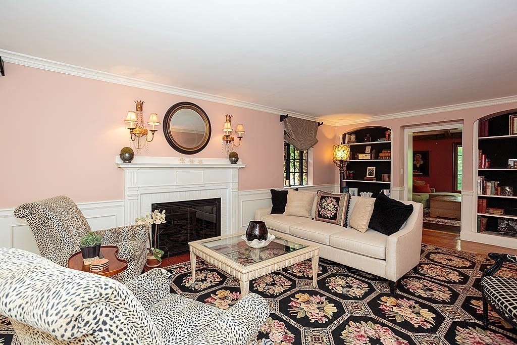 41 Goodnough Road Brookline, MA 02467 - Photo 12 of 36 a living room with furniture a rug and a fireplace