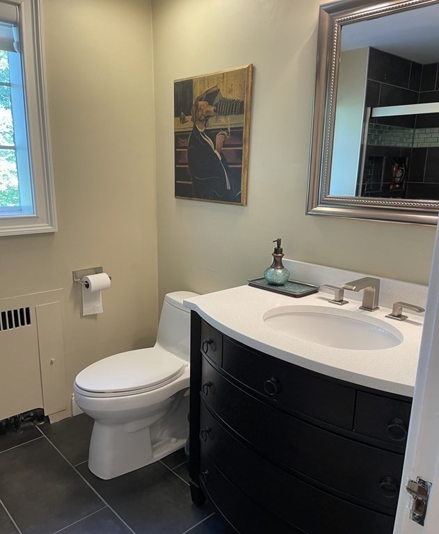 41 Goodnough Road Brookline, MA 02467 - Photo 19 of 36 a bathroom with a sink and a toilet