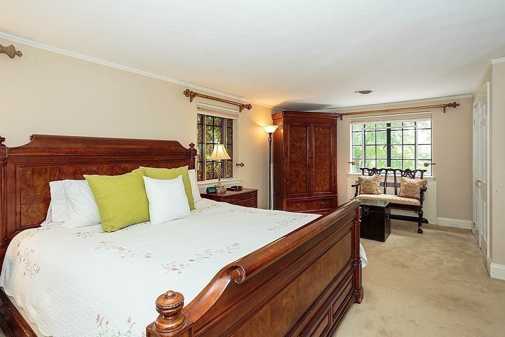 41 Goodnough Road Brookline, MA 02467 - Photo 22 of 36 a bed room with a bed and furniture