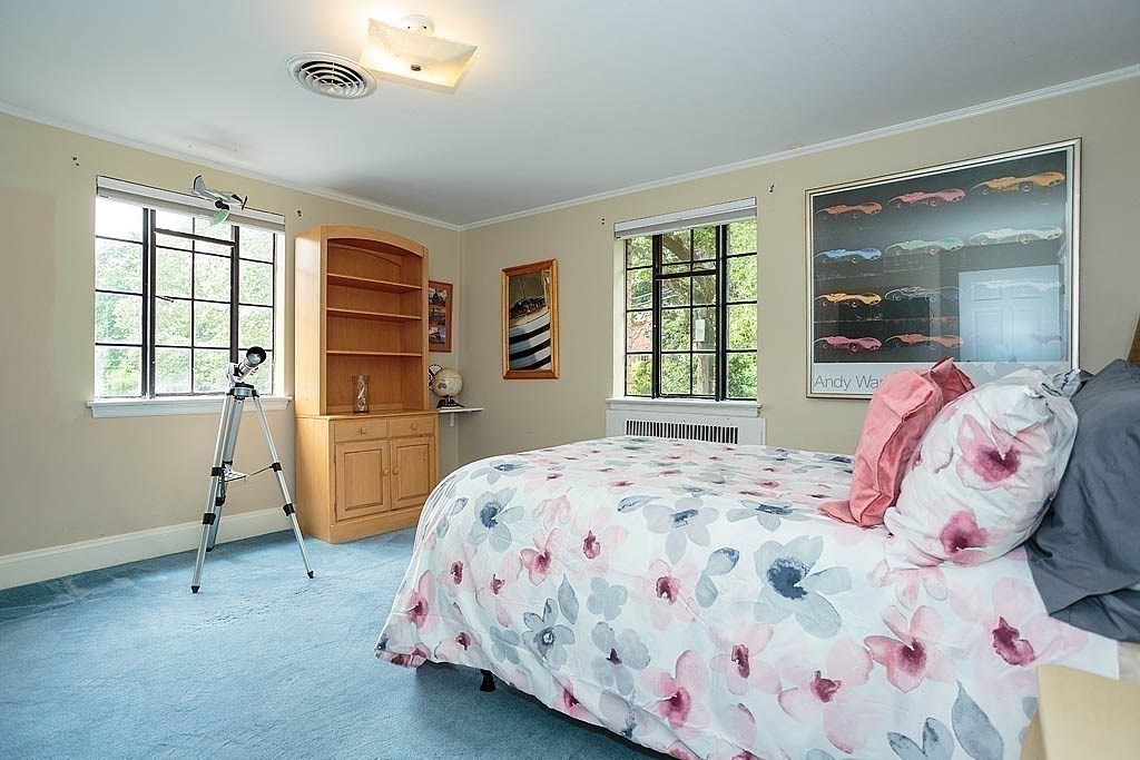 41 Goodnough Road Brookline, MA 02467 - Photo 26 of 36 a bedroom with a bed and a window