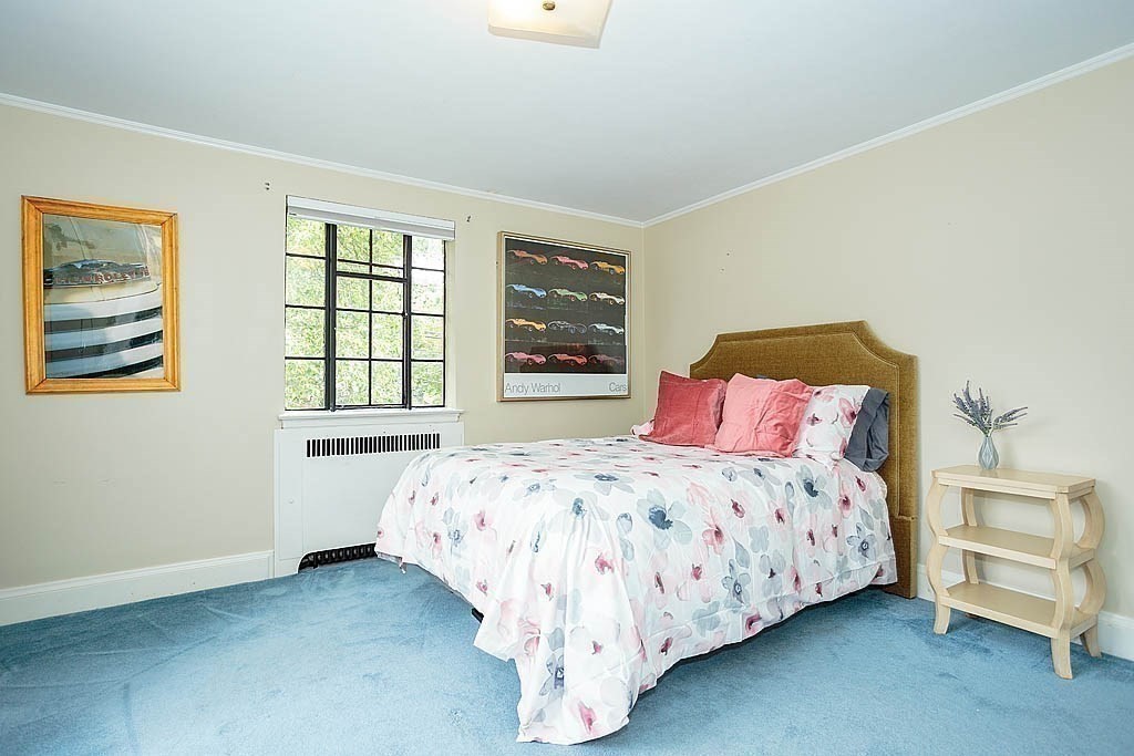 41 Goodnough Road Brookline, MA 02467 - Photo 27 of 36 a bedroom with a bed and window