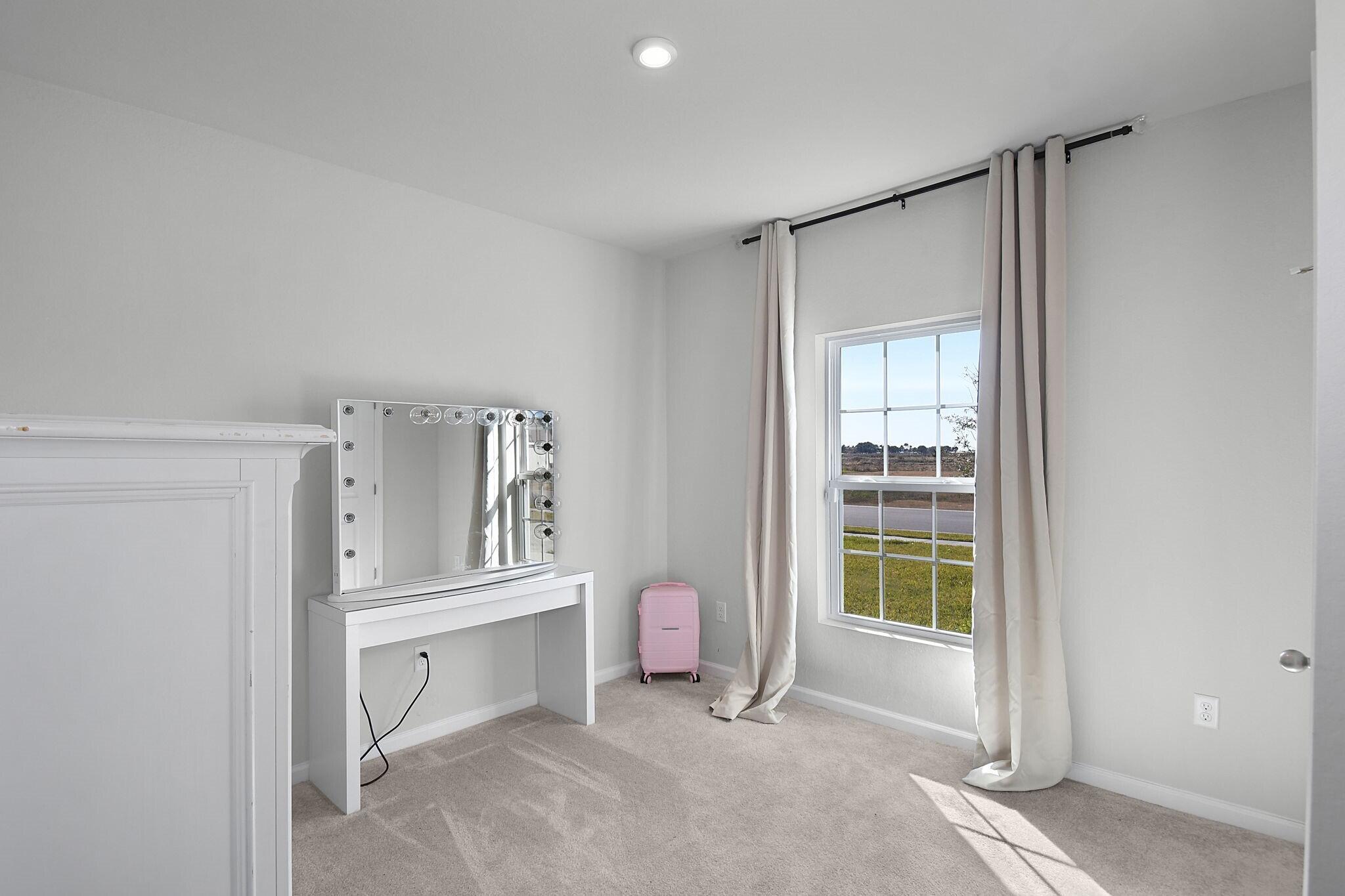113 Dabou Loop Belle Glade, FL 33430 - Photo 15 of 22 a view of livingroom with furniture and entryway