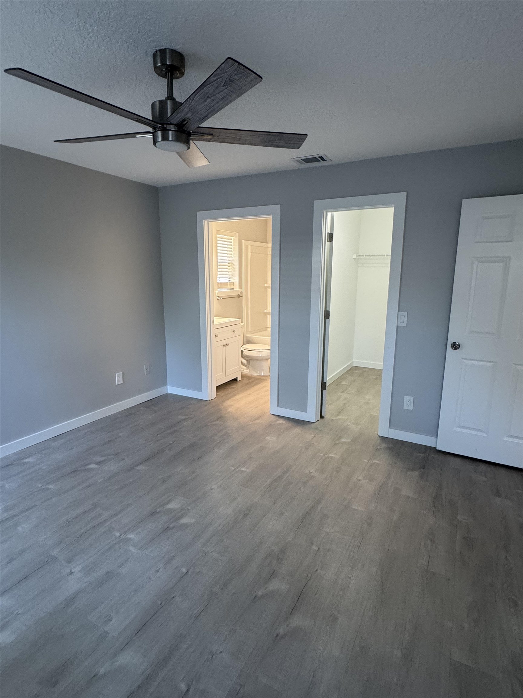 3372 9th Street Elkton, FL 32033 - Photo 13 of 17 a view of a livingroom with a ceiling fan window and a ceiling fan