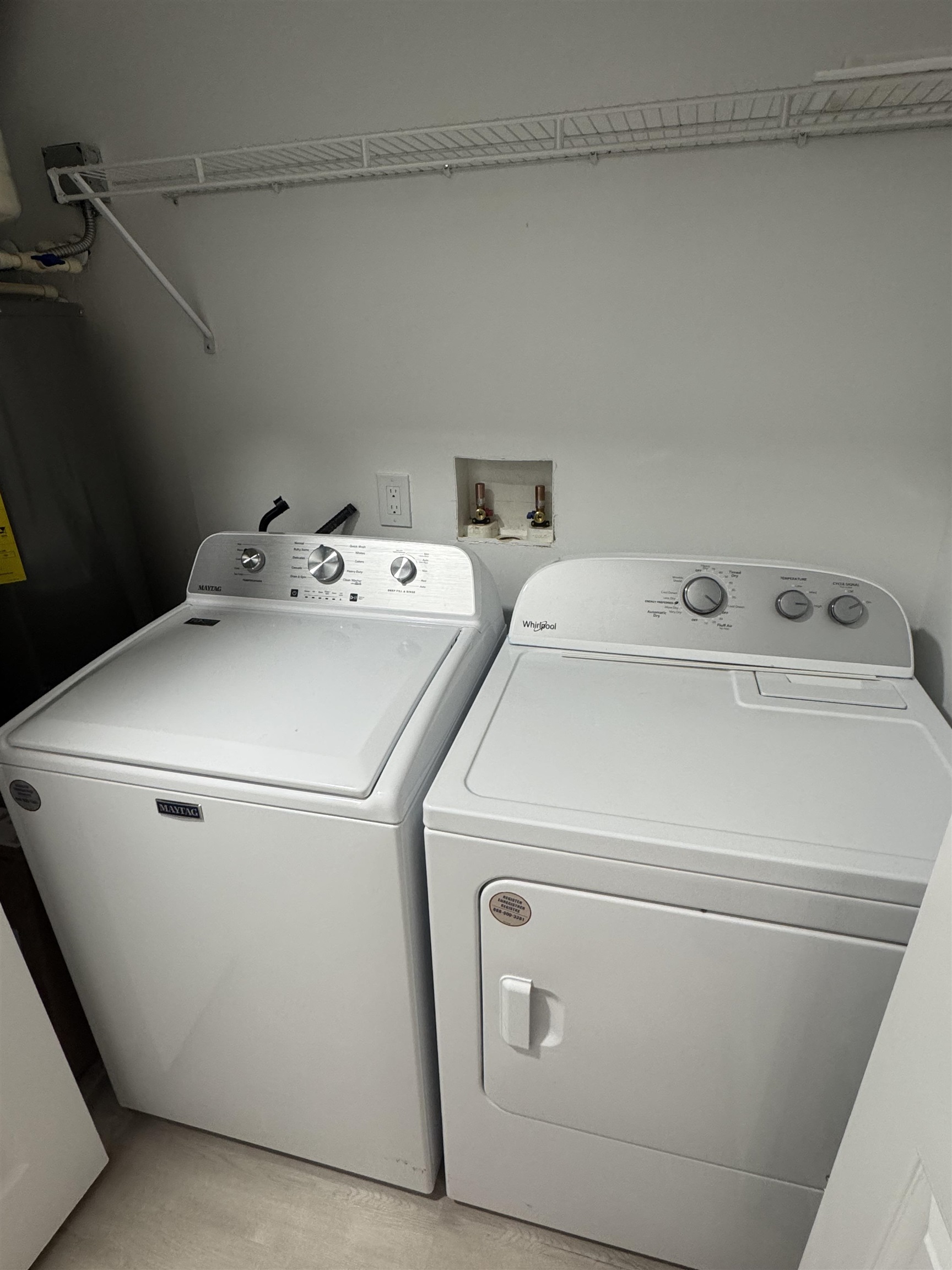 3372 9th Street Elkton, FL 32033 - Photo 15 of 17 a utility room with dryer and washer