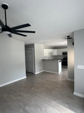 a view of a kitchen with a sink