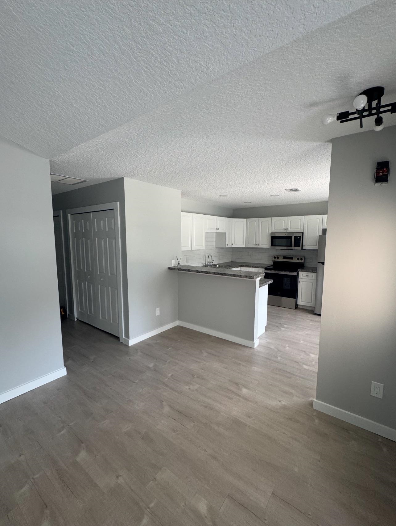3372 9th Street Elkton, FL 32033 - Photo 6 of 17 a view of a kitchen with a sink