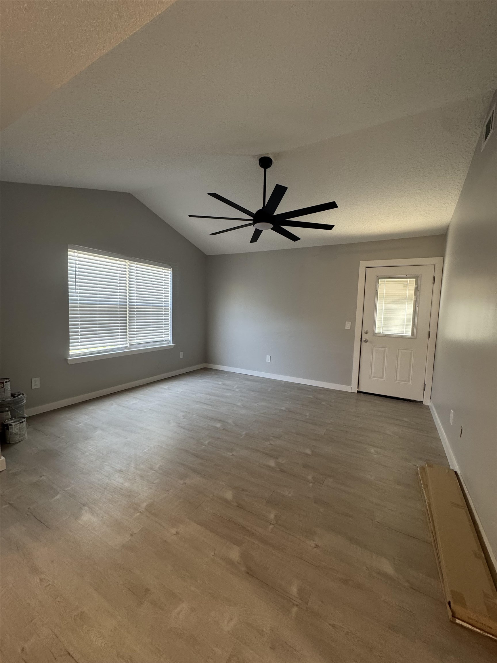 3372 9th Street Elkton, FL 32033 - Photo 9 of 17 an empty room with windows and closet