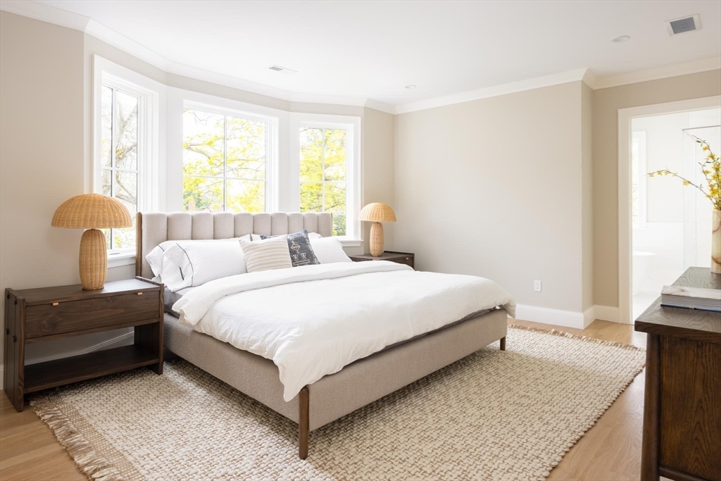 15 Woodcliff Road Newton, MA 02461 - Photo 14 of 27 a bedroom with a bed and a window