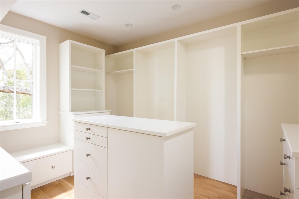 15 Woodcliff Road Newton, MA 02461 - Photo 17 of 27 a view of cabinets with wooden floor