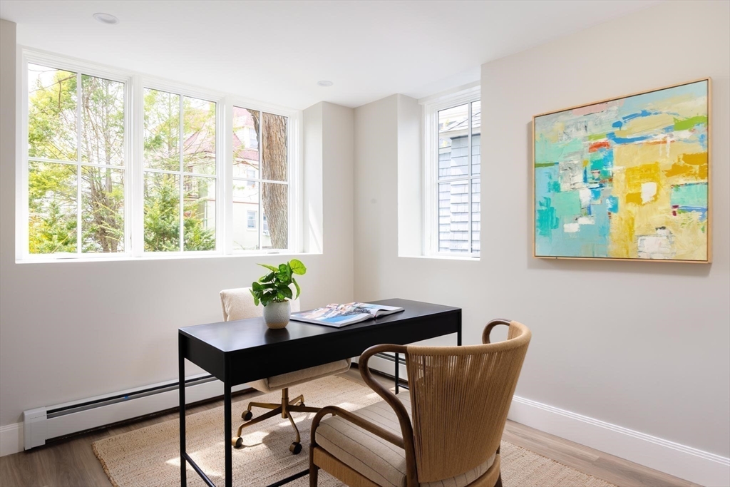 15 Woodcliff Road Newton, MA 02461 - Photo 21 of 27 a view of a dining room with furniture window and outside view