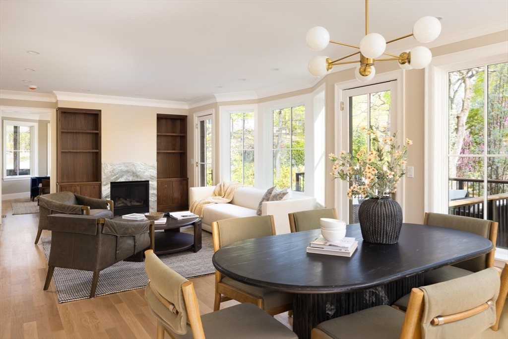 15 Woodcliff Road Newton, MA 02461 - Photo 6 of 27 a living room with fireplace furniture and a large window