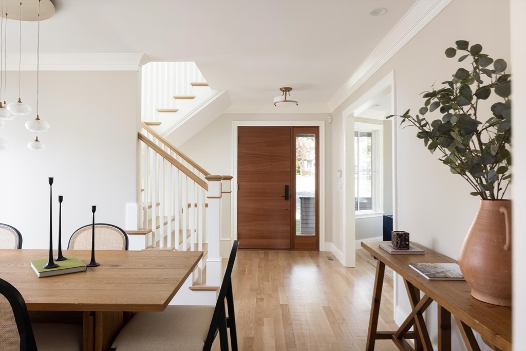 15 Woodcliff Road Newton, MA 02461 - Photo 8 of 27 a view of a dining room with furniture and wooden floor