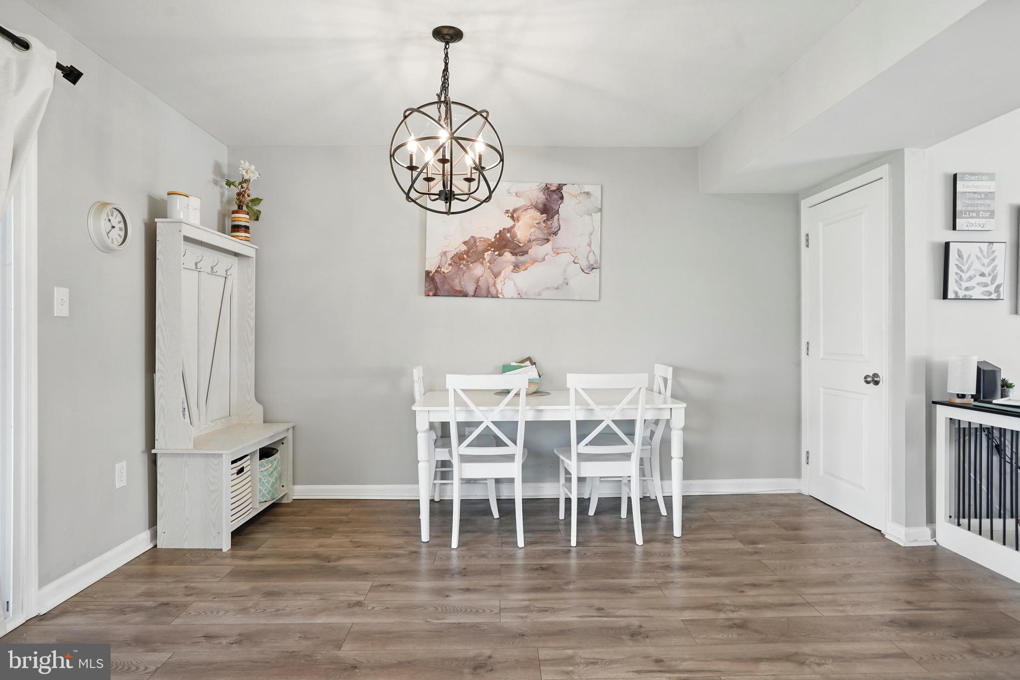 7812 Jamesford Road Dundalk, MD 21222 - Photo 15 of 30 a view of a dining room that has a table and chairs