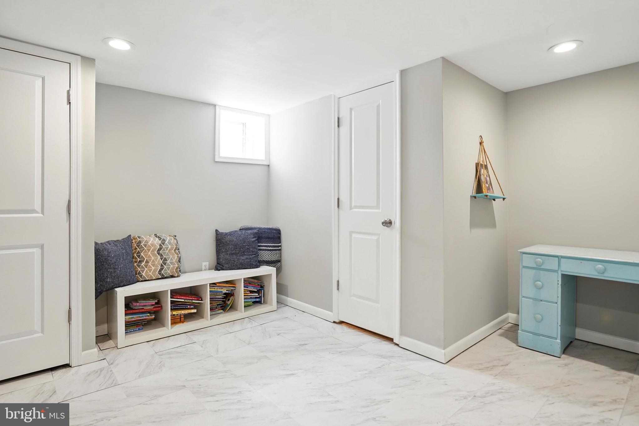 7812 Jamesford Road Dundalk, MD 21222 - Photo 19 of 30 a room with furniture and window