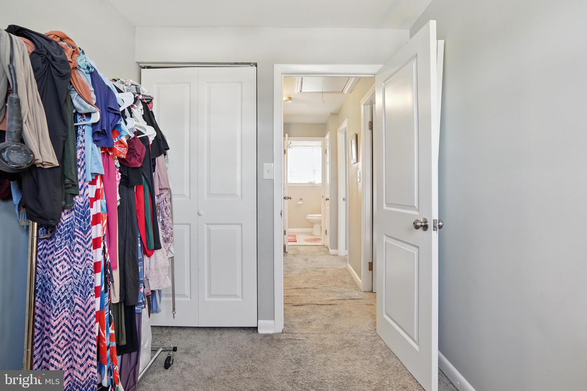 7812 Jamesford Road Dundalk, MD 21222 - Photo 25 of 30 a view of walk in closet with clothes