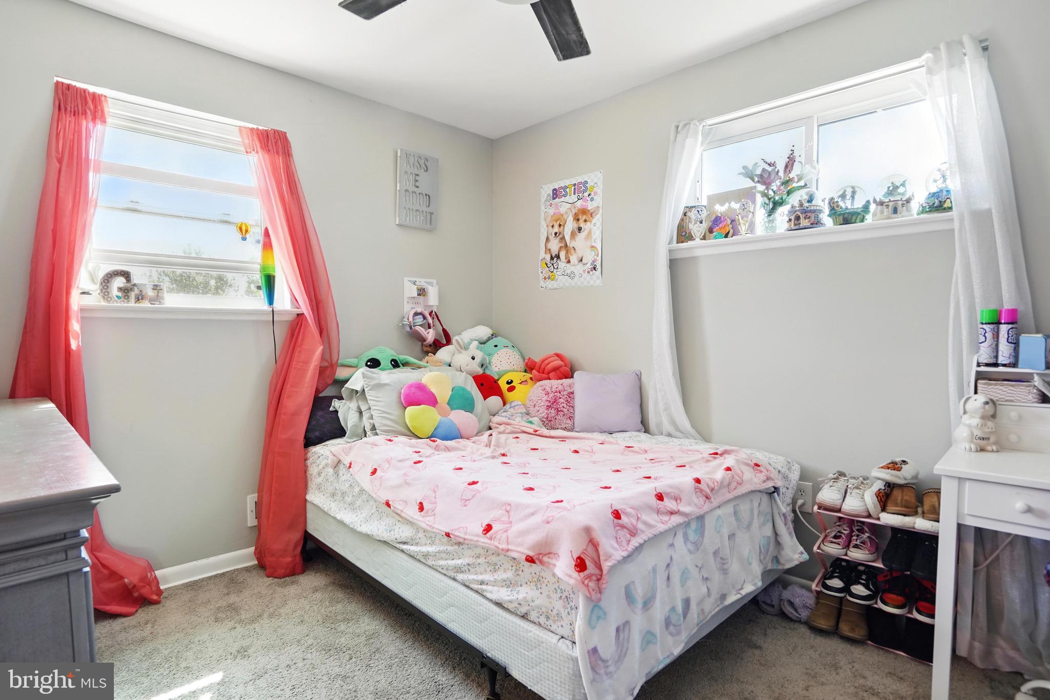 7812 Jamesford Road Dundalk, MD 21222 - Photo 26 of 30 a bedroom with a bed and a window