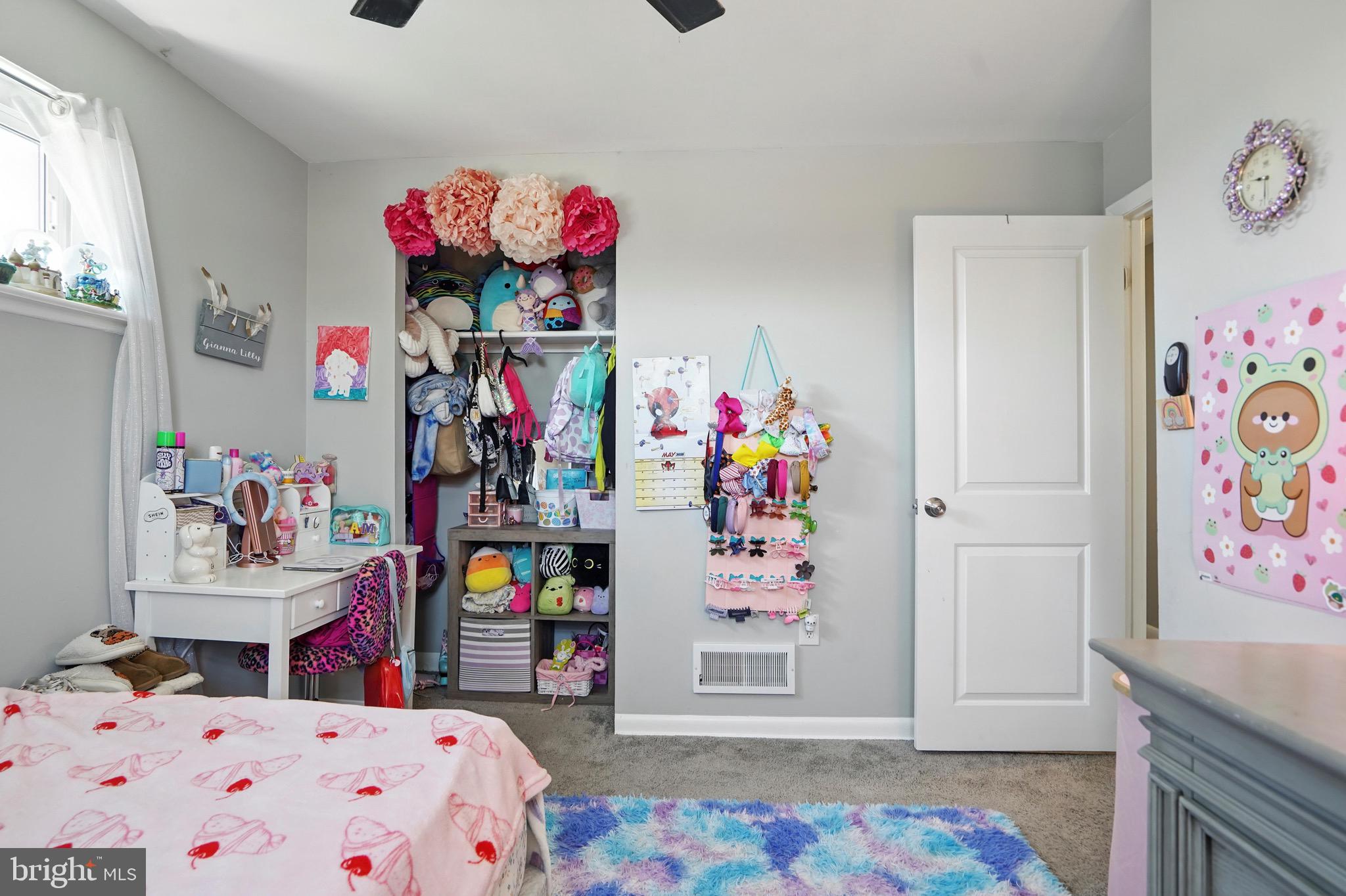 7812 Jamesford Road Dundalk, MD 21222 - Photo 28 of 30 a bedroom with baby bed and a window