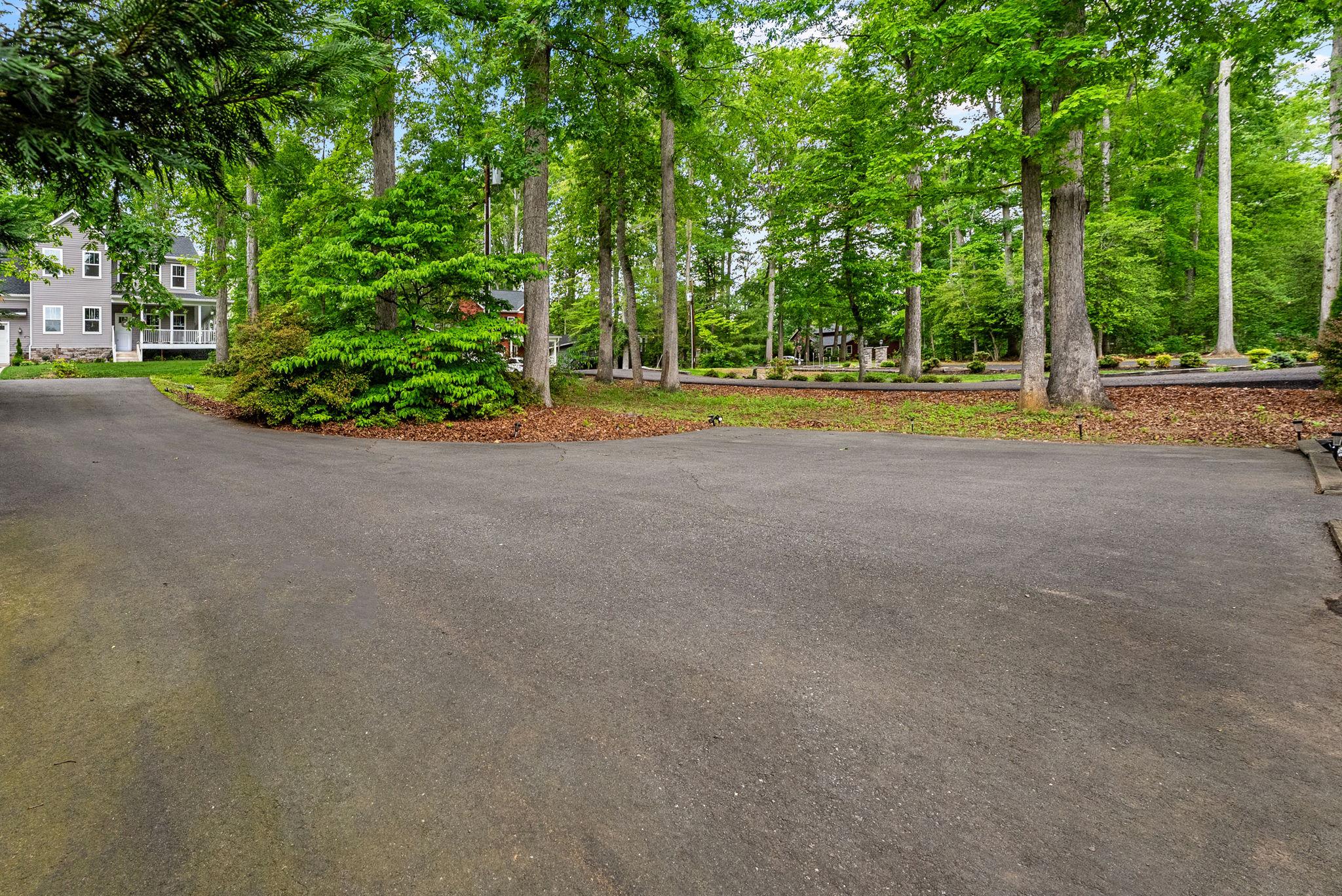 102 Confederate Circle Locust Grove, VA 22508 - Photo 34 of 45 Large, wooded driveway w/ space for multiple cars