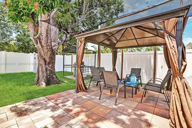 a garden view with a seating space