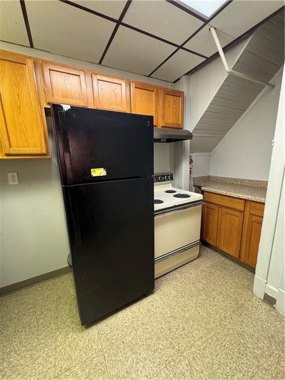 650 Ardmore Boulevard Pittsburgh, PA 15221 - Photo 15 of 48 a kitchen with a refrigerator and a more cabinets