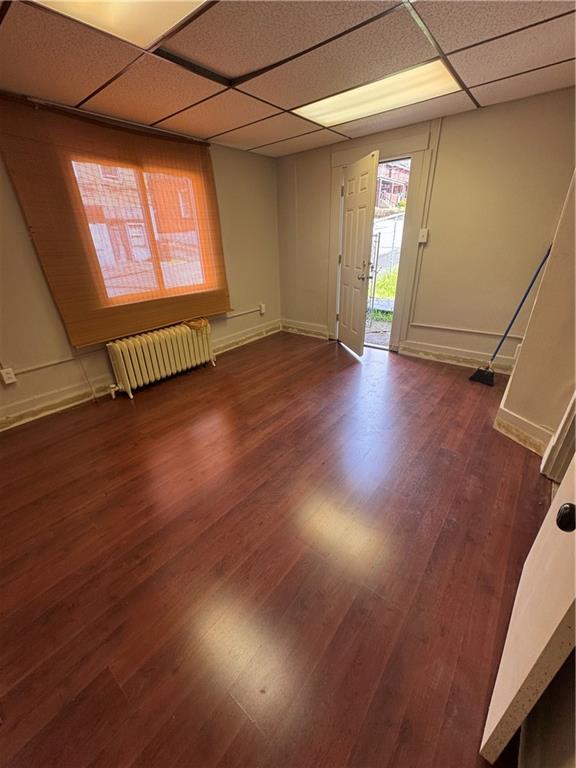 650 Ardmore Boulevard Pittsburgh, PA 15221 - Photo 27 of 48 an empty room with wooden floor and windows