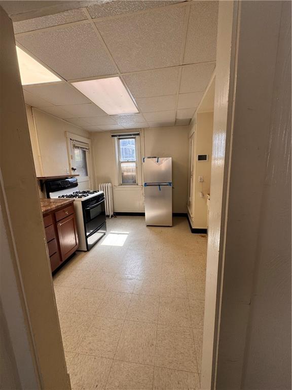 650 Ardmore Boulevard Pittsburgh, PA 15221 - Photo 30 of 48 a kitchen with furniture and a fireplace
