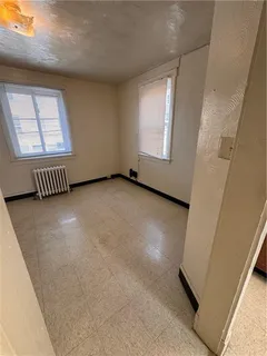 a view of a hallway with staircase