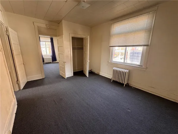 an empty room with windows