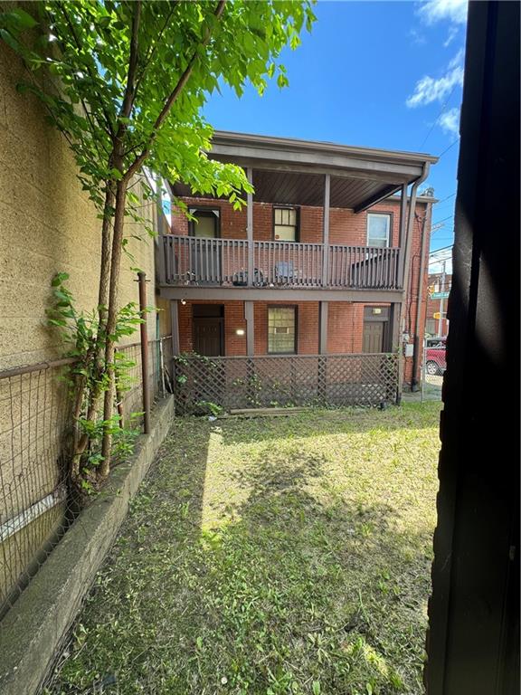 650 Ardmore Boulevard Pittsburgh, PA 15221 - Photo 6 of 48 a front view of a house with a yard