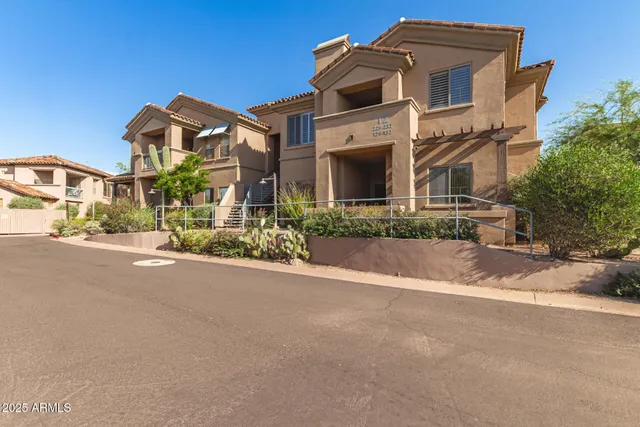 a view of a building with a street