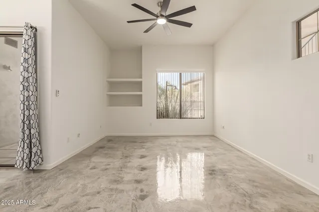 an empty room with windows