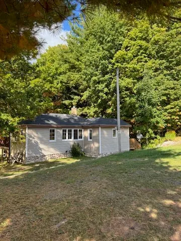 $225,000 | 14166 Hicks Lake Drive, Evart, MI 49631