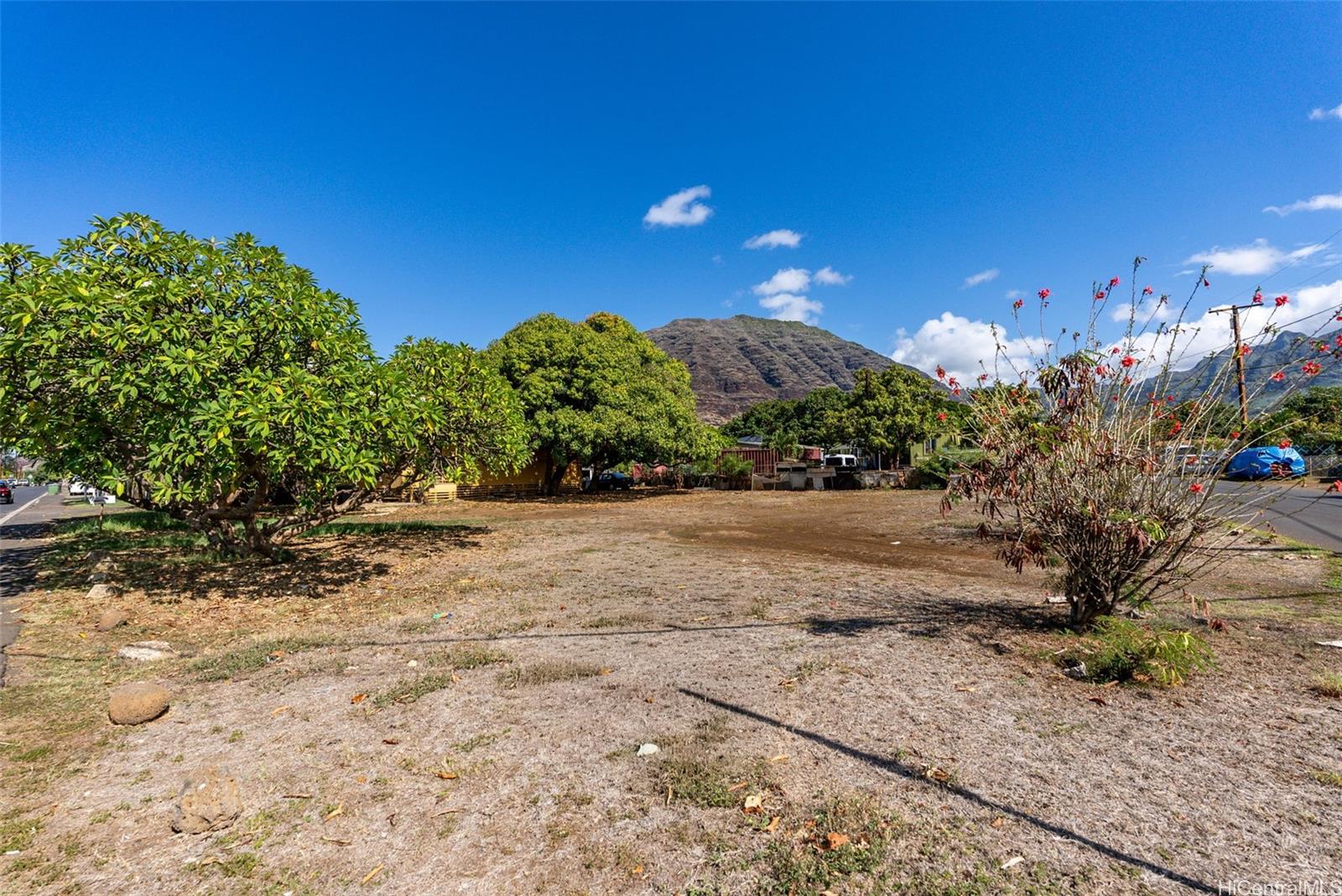 84-856 Lahaina Street, Unit C Waianae, HI 96792 - Photo 4 of 12 a view of a road with a yard