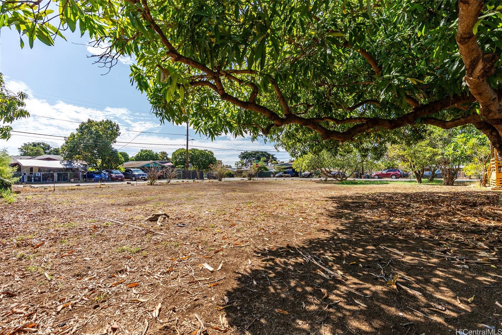84-856 Lahaina Street, Unit C Waianae, HI 96792 - Photo 8 of 12 a view of street with large trees