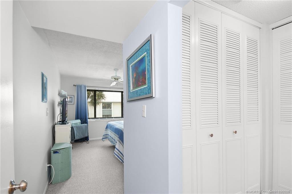 175 Southeast St Lucie Boulevard, Unit A90 Stuart, FL 34996 - Photo 22 of 46 Hallway to Master Bedroom