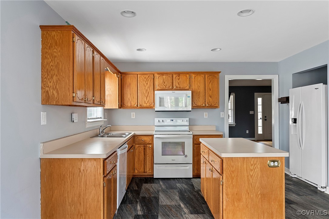 4350 Broadstreet Road Gum Spring, VA 23065 - Photo 20 of 48 a kitchen with a sink stove top oven and refrigerator