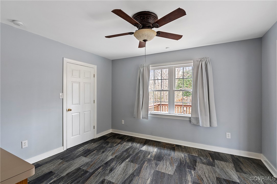 4350 Broadstreet Road Gum Spring, VA 23065 - Photo 22 of 48 a view of an empty room with wooden floor and a window
