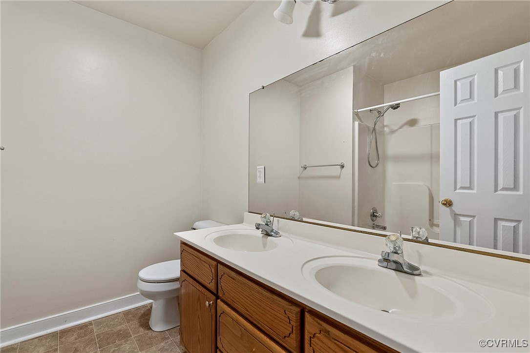 4350 Broadstreet Road Gum Spring, VA 23065 - Photo 32 of 48 a bathroom with a sink toilet and shower