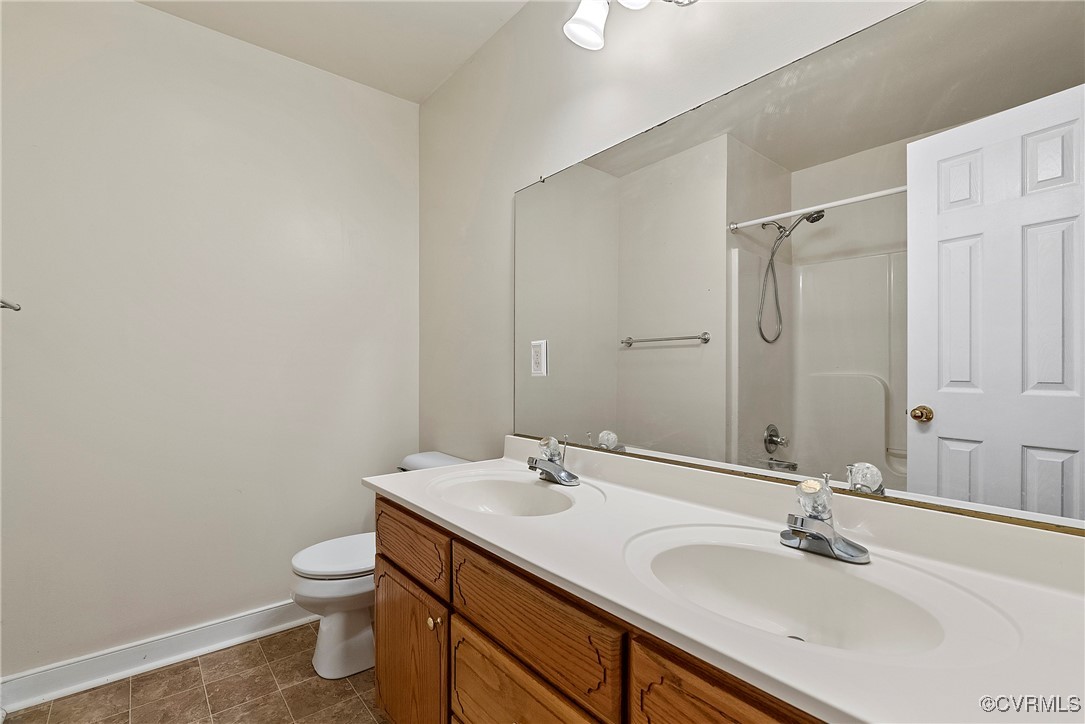 4350 Broadstreet Road Gum Spring, VA 23065 - Photo 33 of 48 a bathroom with a sink toilet and shower