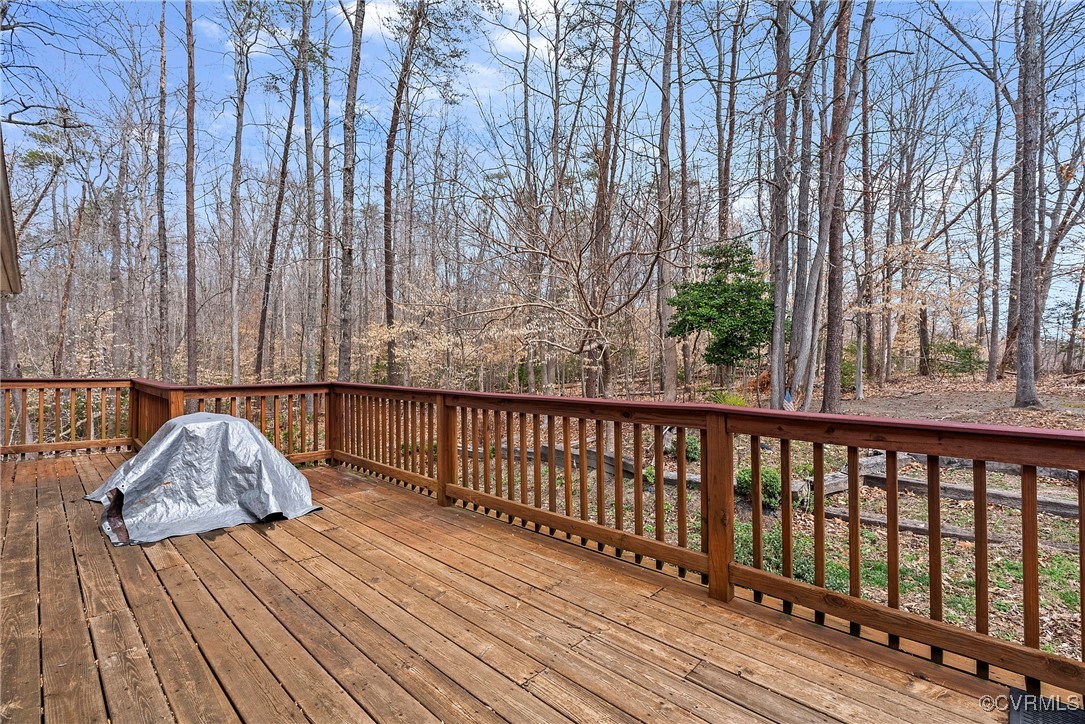 4350 Broadstreet Road Gum Spring, VA 23065 - Photo 6 of 48 a balcony with wooden floor and fence