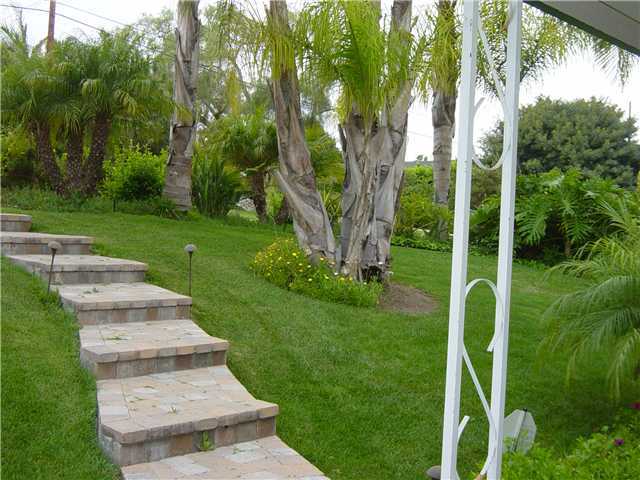 3122 Roadrunner Road San Marcos, CA 92078 - Photo 19 of 24 Brick steps lead to front door. Look at the front yard landscaping