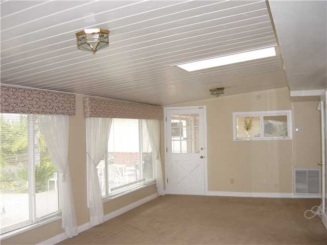 3122 Roadrunner Road San Marcos, CA 92078 - Photo 5 of 24 light & bright & under heat and air conditioning looks out on views of rear yeard