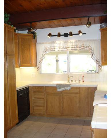 3122 Roadrunner Road San Marcos, CA 92078 - Photo 7 of 24 Kitchen looks out on views of mountains and,of course, the perfect rear yard