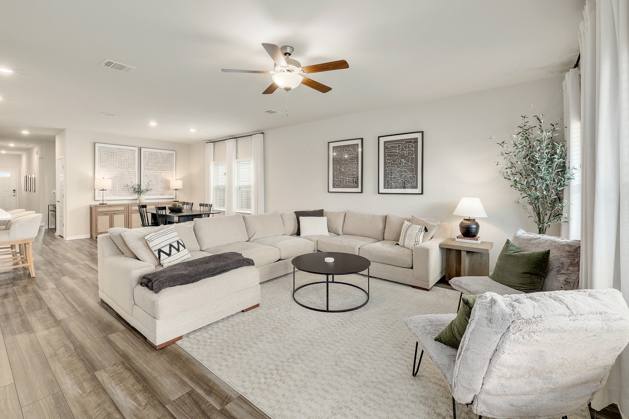 Practically new, this home offers neutral, peaceful finishes