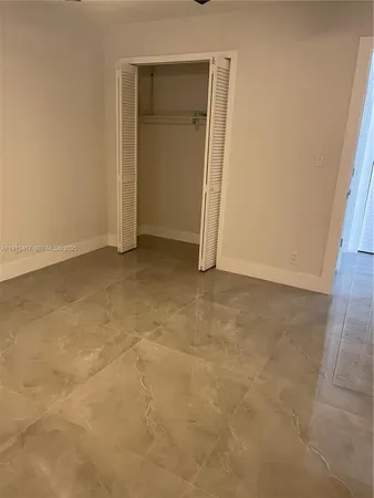 an empty room with closet