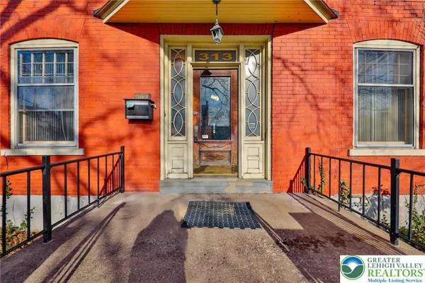 a front view of a house with a porch