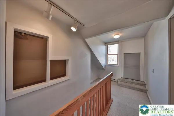 a view of a hallway with a elevator