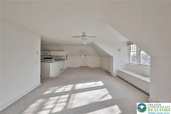 a view of a porch with wooden floor and outdoor space