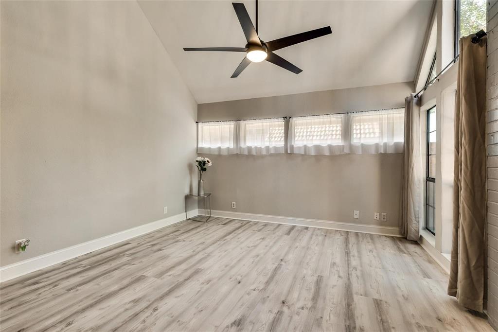 18240 Midway Road, Unit 302 Dallas, TX 75287 - Photo 5 of 33 wooden floor in an empty room